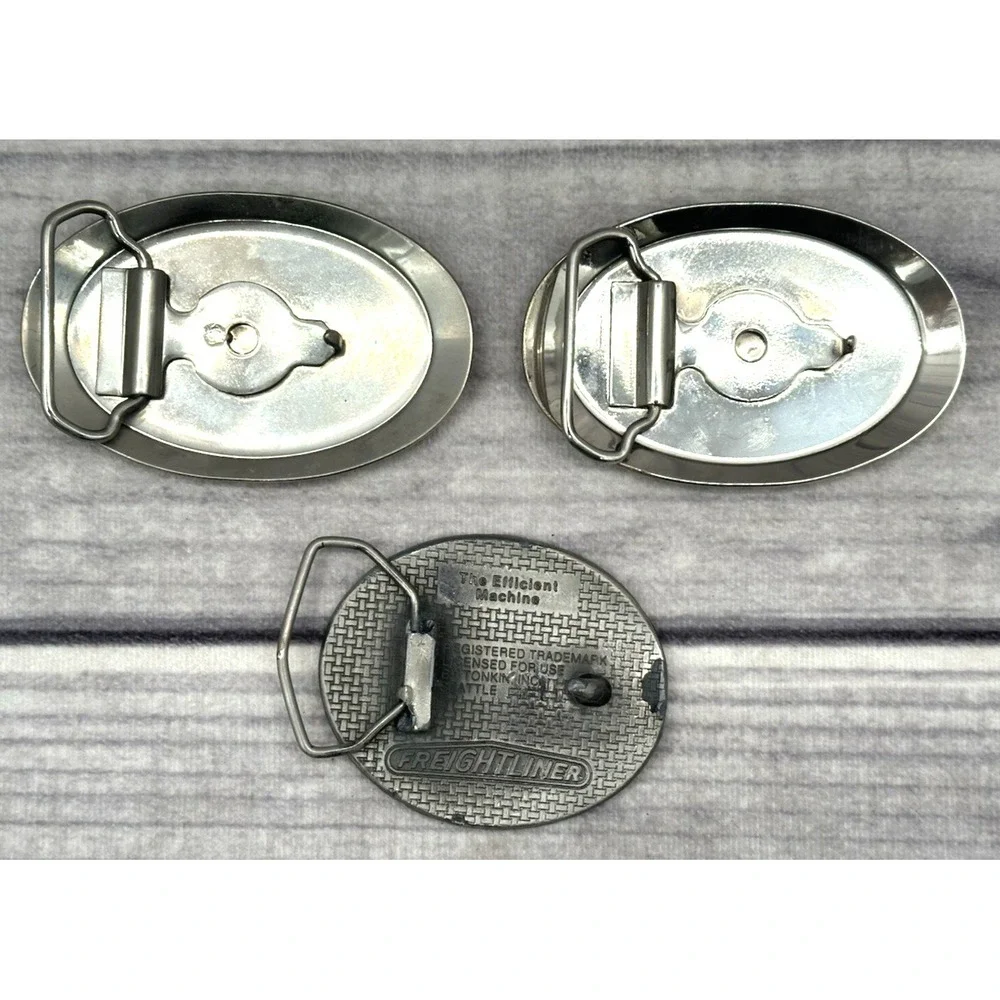 3 VINTAGE TRUCKING BELT BUCKLES - FREIGHTLINER BY TONKIN INC / 2 UNMARKED‎